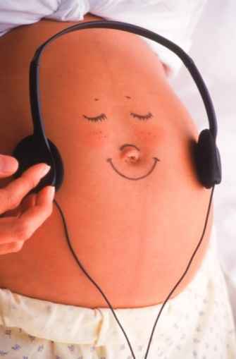 Body paint em barriga de grávida