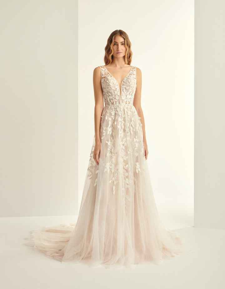 O tecido do meu vestido é___ - 1