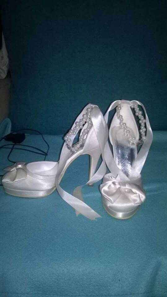 Os teus sapatos de noiva serão... - 1