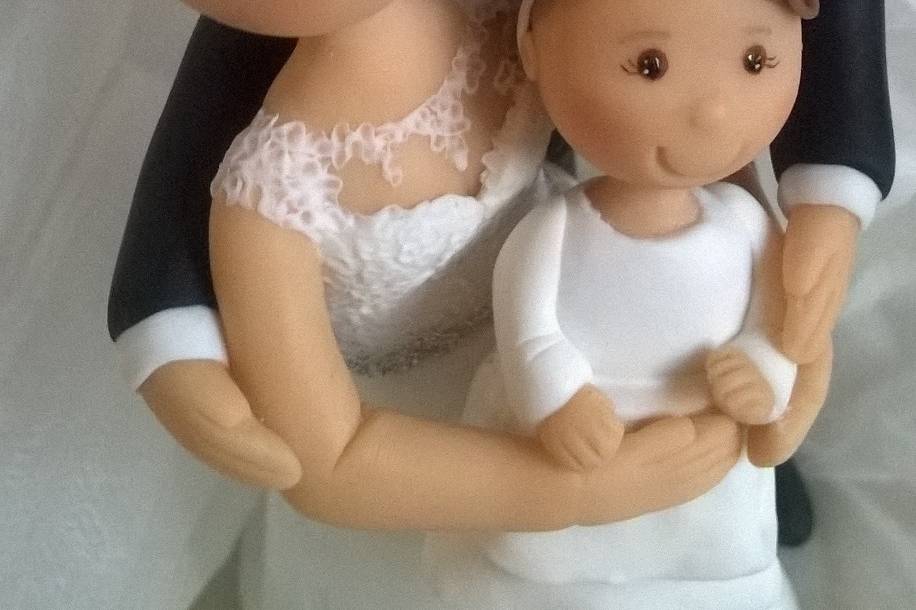 Noivos e bebé (rosto boneco)