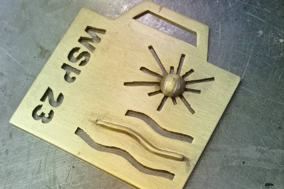 Exemplo de lembrança em latão