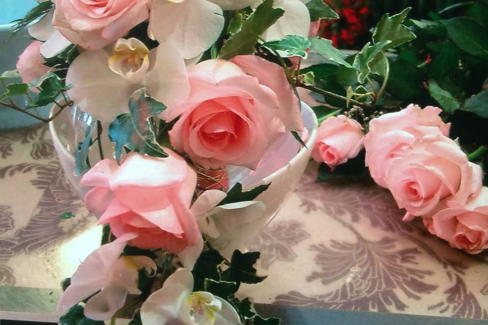 Bouquet de rosas e orquídeas
