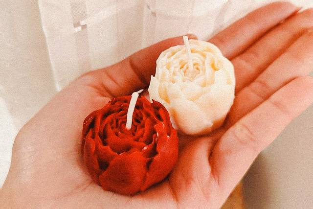 Vela em formato de flores