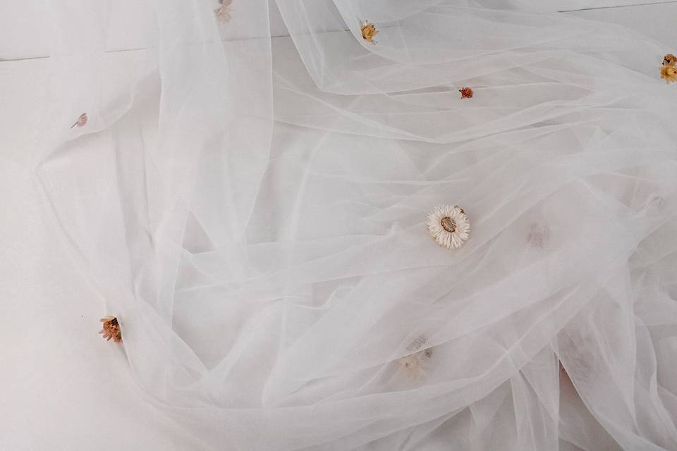 Véu de flores secas