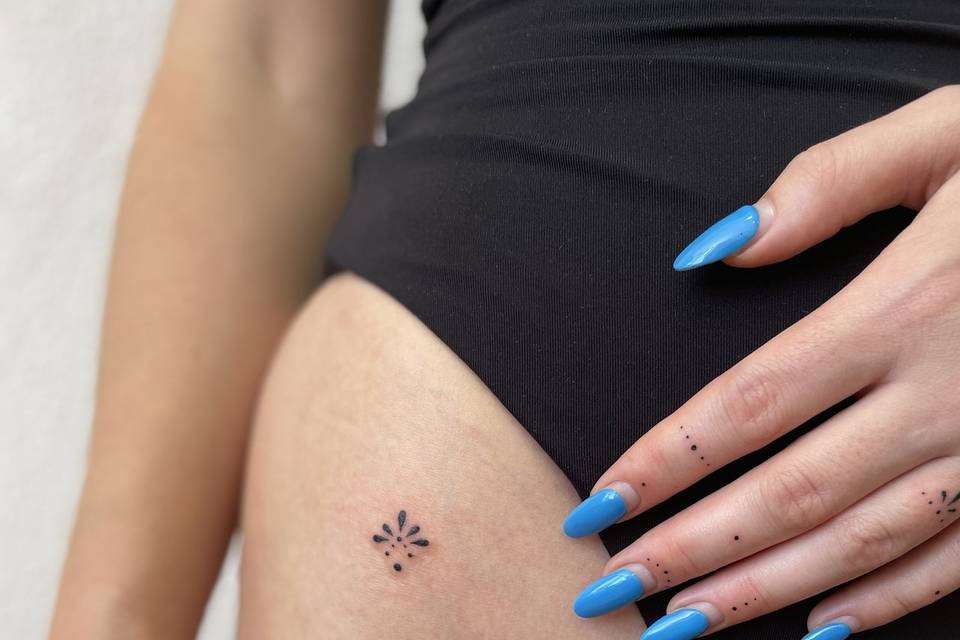 Mini tatto com cerca de 2cm