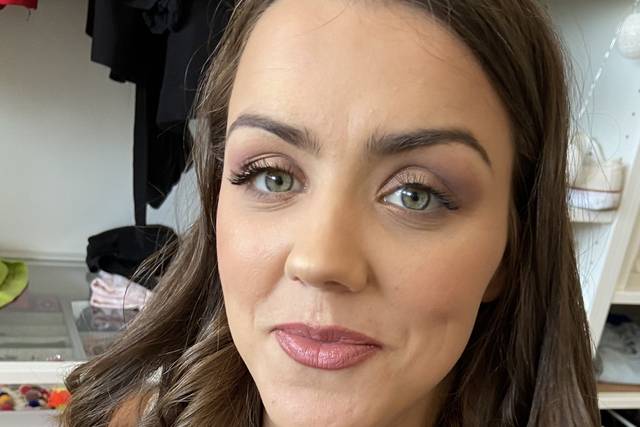 Soft glam makeup and hair.