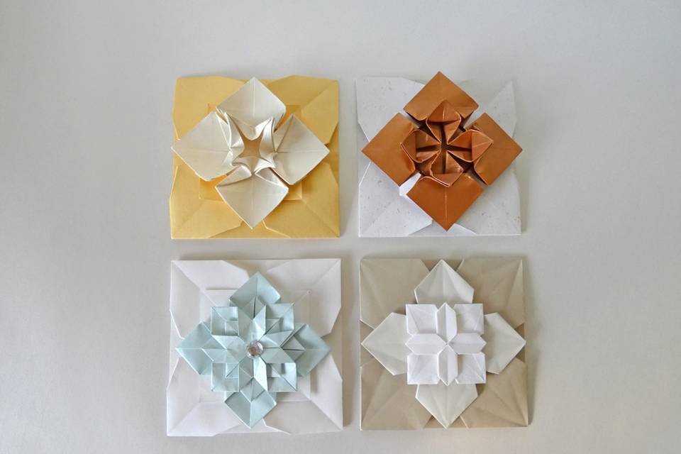 Envelopes com topos origami