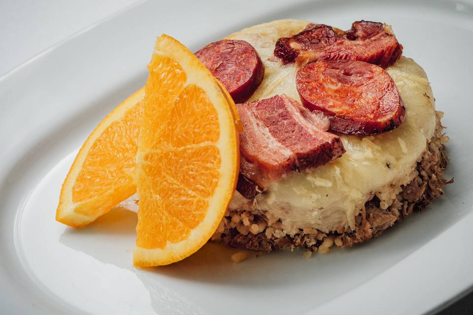 Prato famoso: arroz de pato.